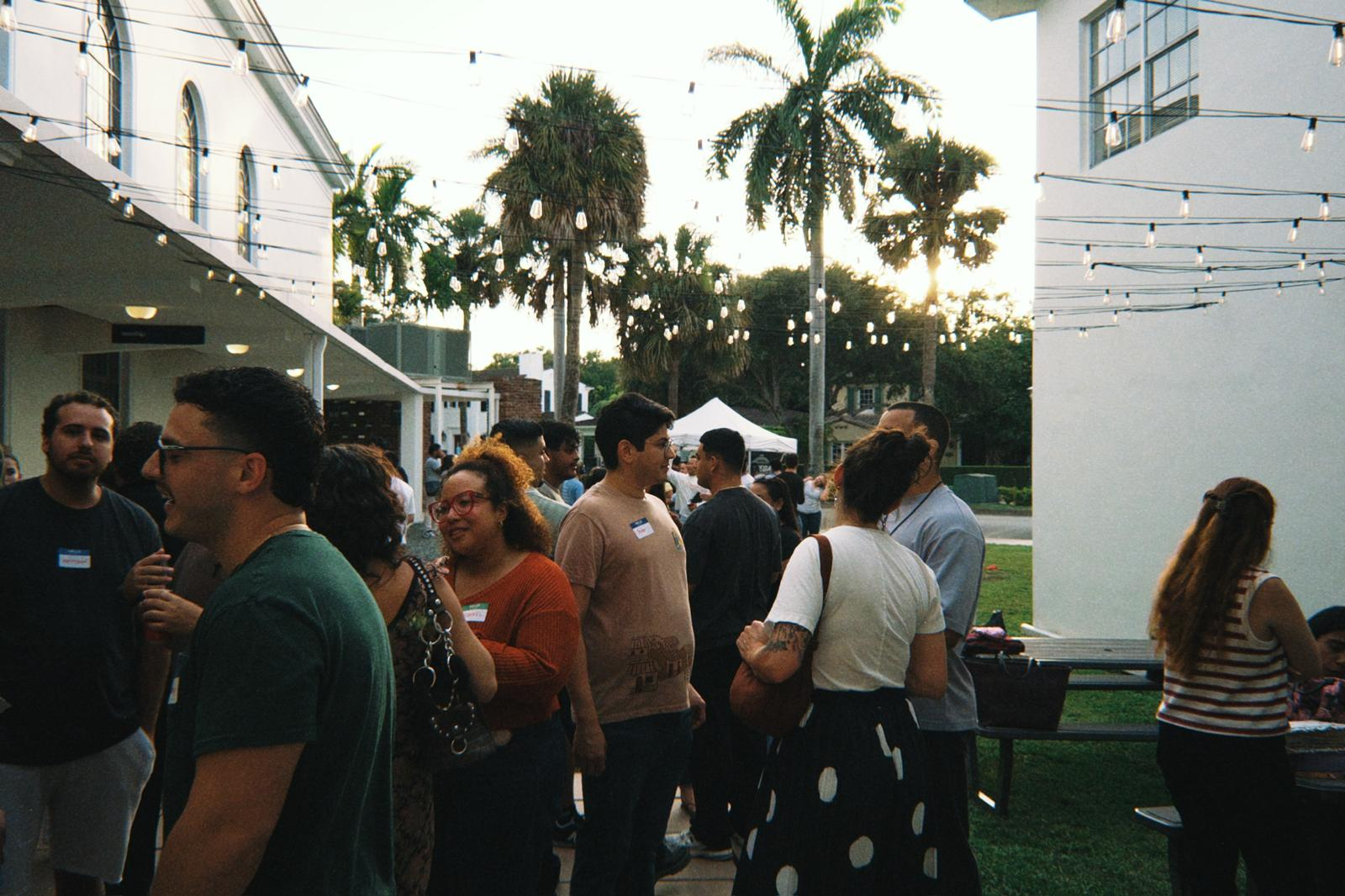 People gathered together in worship at a local church